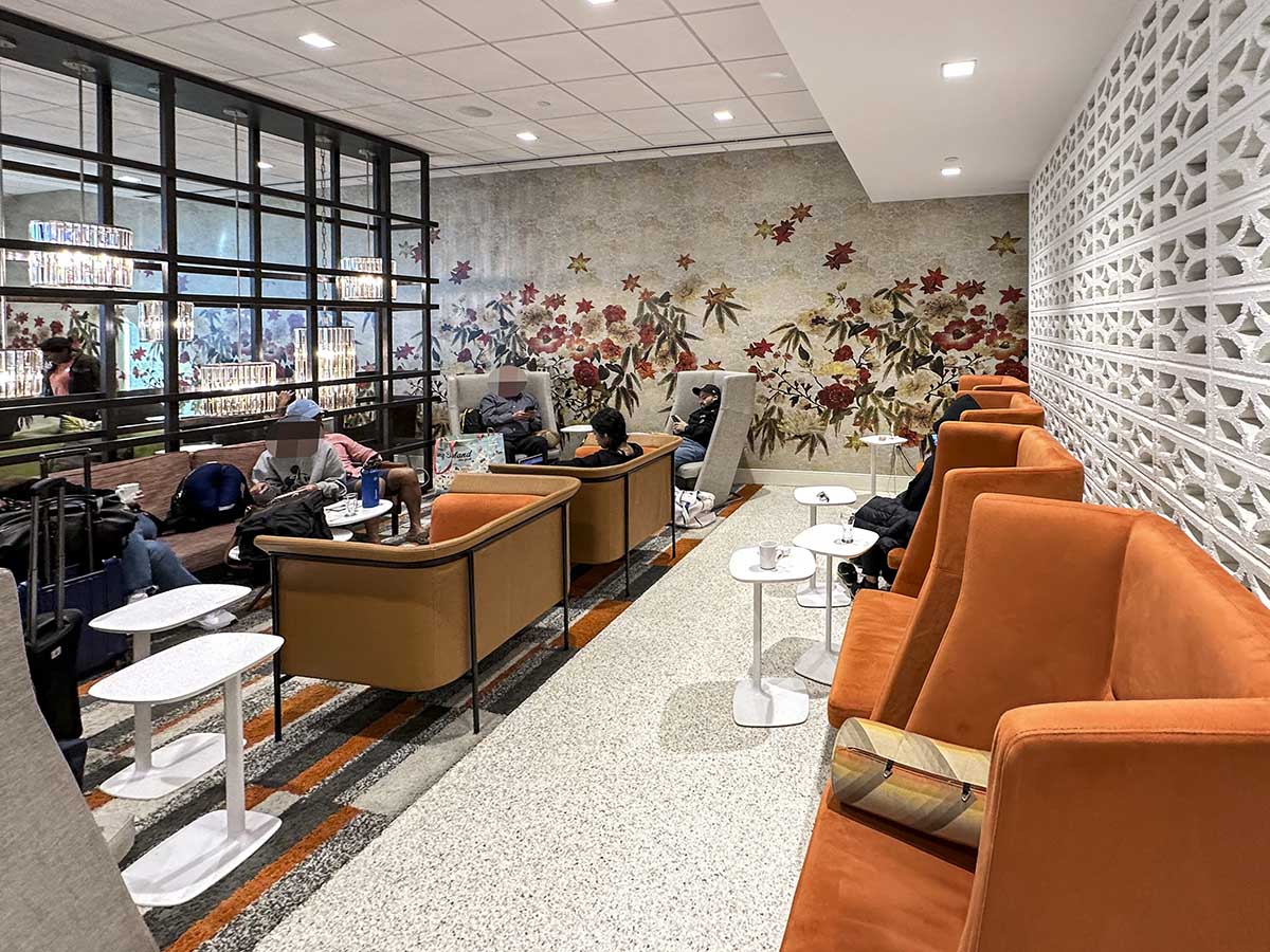 Different seating types inside of the Amex Escape Lounge FLL 