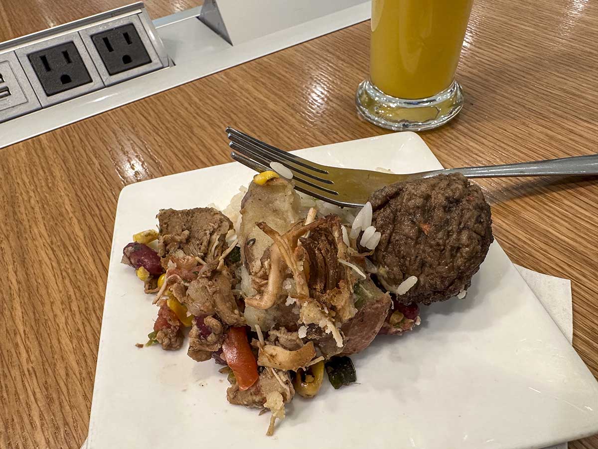 My plate of food in the Amex Escape Lounge FLL 