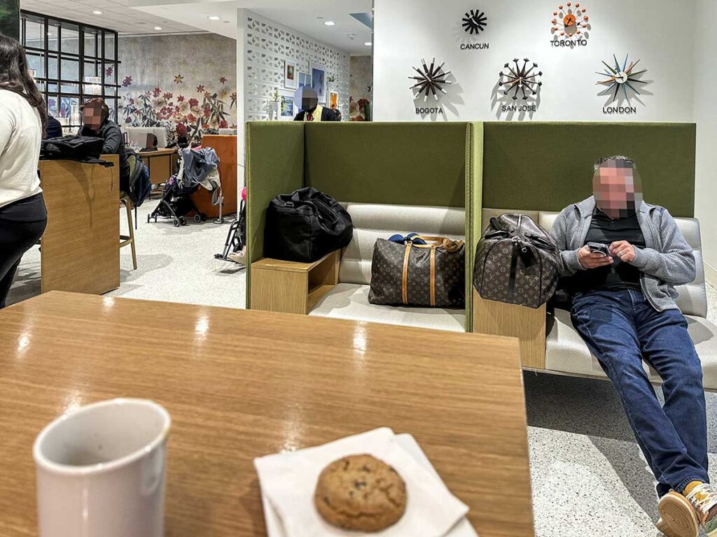 Enjoying coffee and cookies in the Amex Escape Lounge FLL 