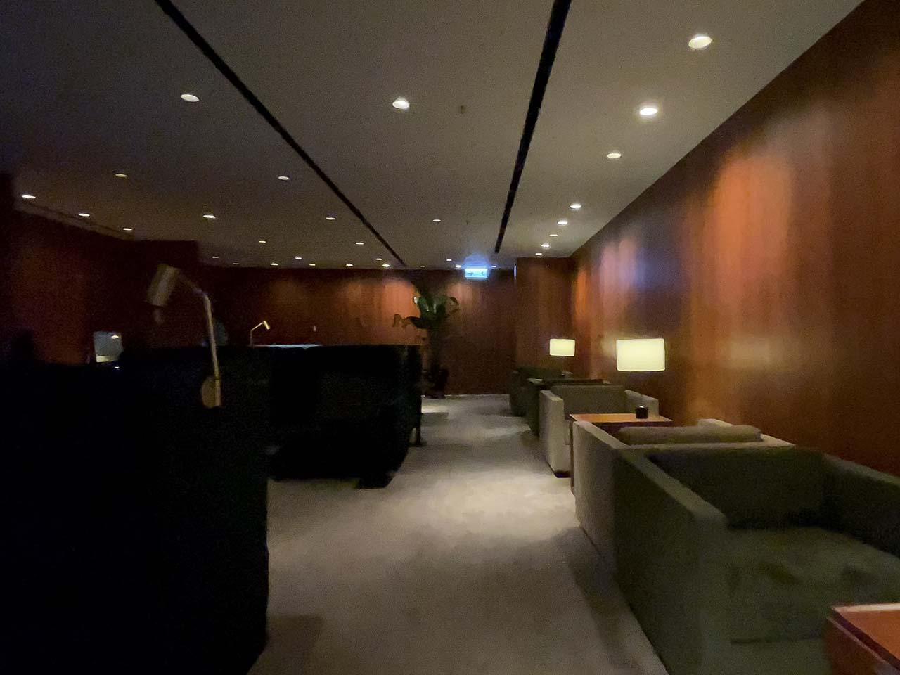 Low light lounge seating in the Cathay Pacific The Pier Lounge Hong Kong
