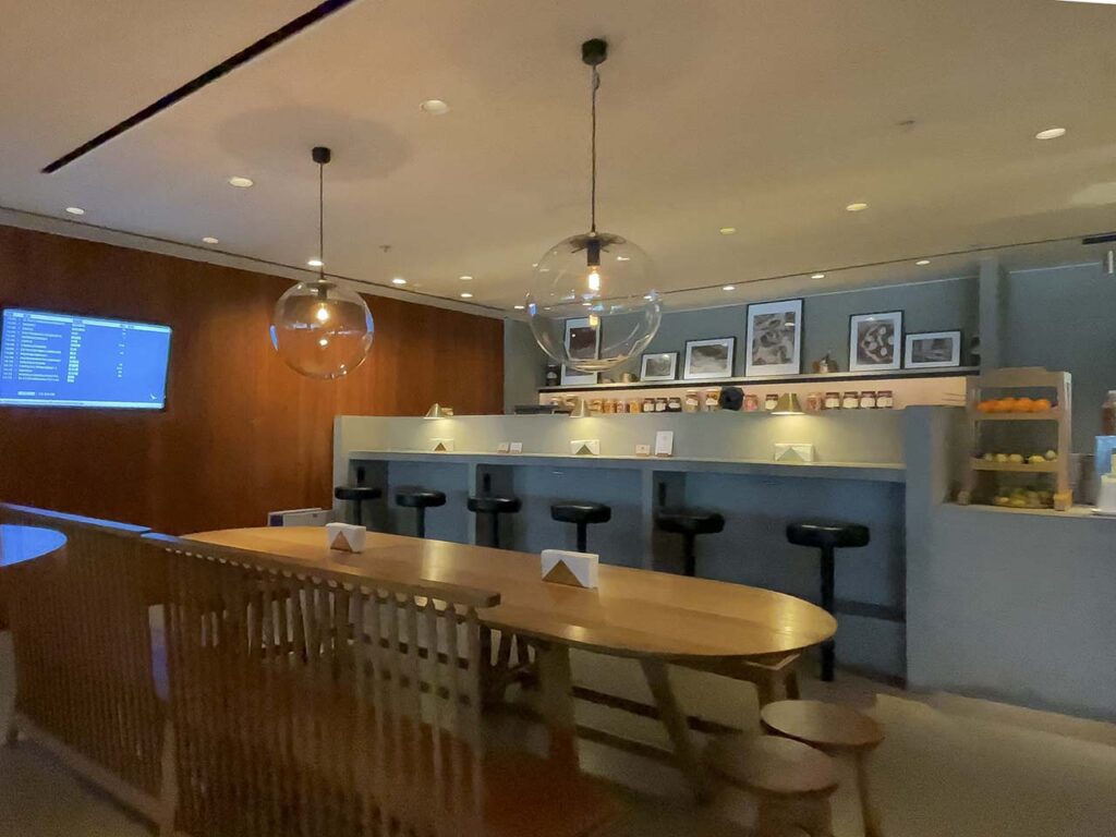Bar style seating area in the Cathay Pacific The Pier Lounge Hong Kong