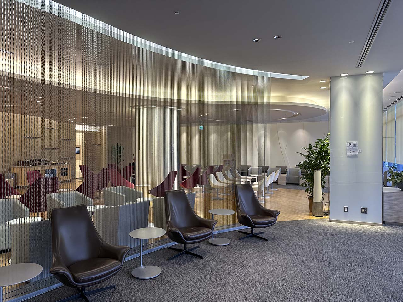 Sectioned off rooms with different seating types in the Korean Air Lounge Terminal 1 Narita Airport