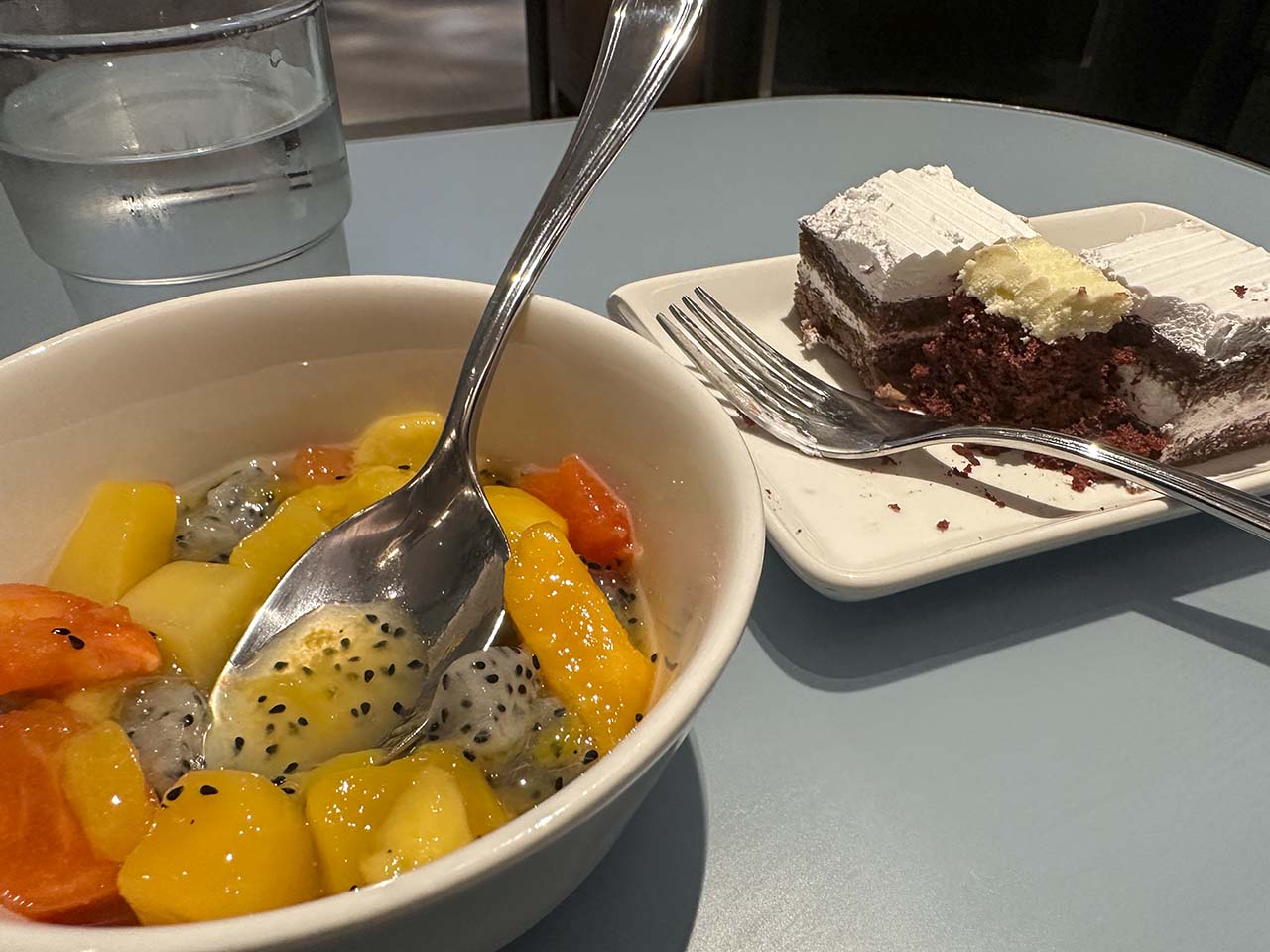 My dessert consisting of cake and fruit salad during my visit to the Korean Air Lounge Incheon