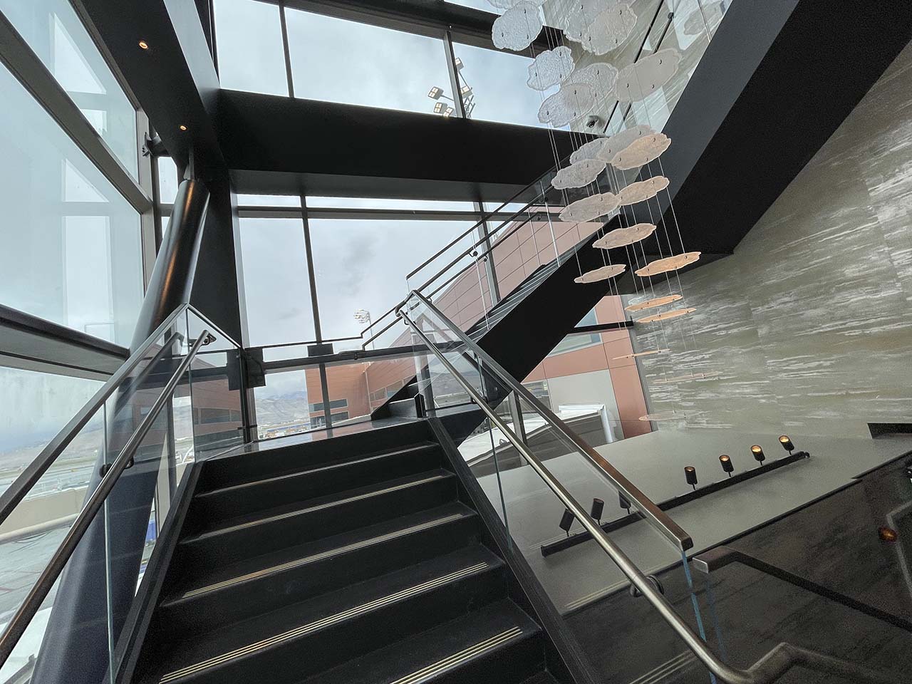 Staircase leading up to the main entrance of the SLC Amex Lounge