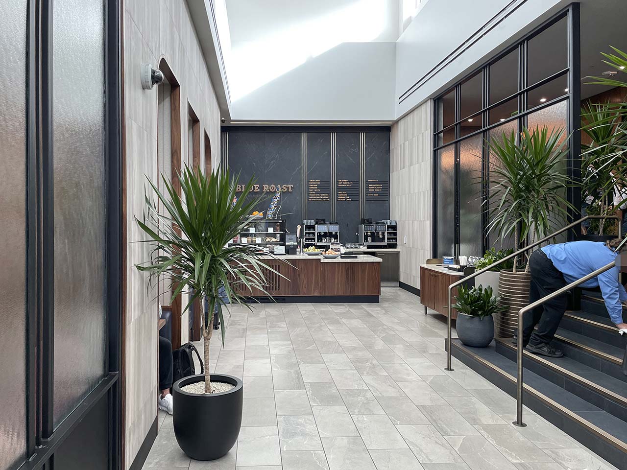 Central hallway with Blue Roast snack bar in the SLC Amex Lounge