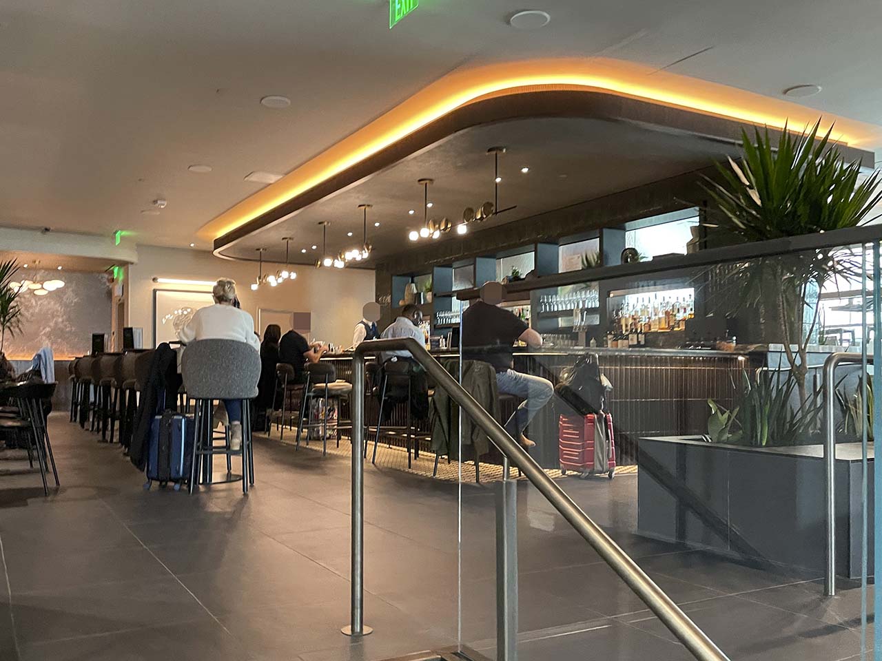 Fully staffed bar inside of the SLC Amex Lounge