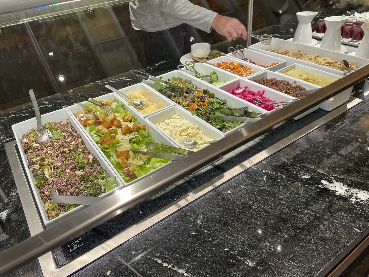 Pasta and salad items in the SLC Amex Lounge