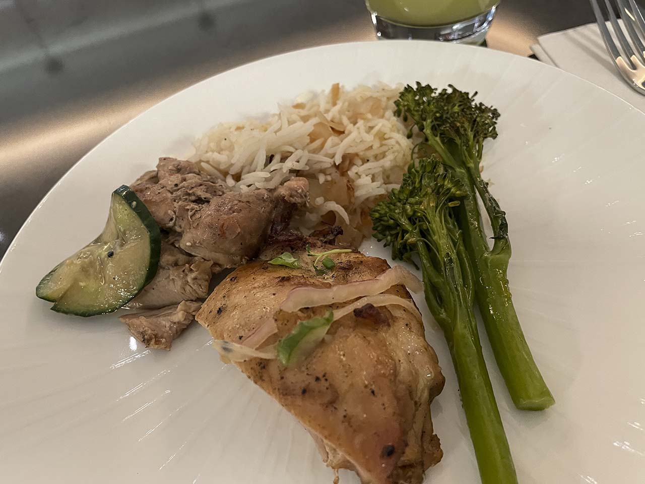 My lunch featuring chicken and rice and vegetables in the SLC Amex Lounge