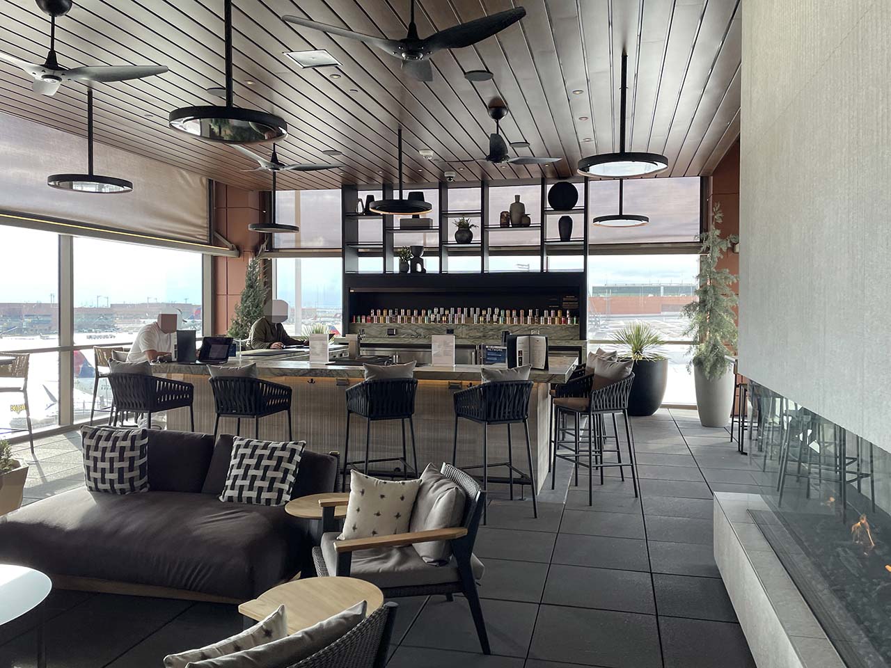 The bar in the terrace at the SLC Amex Lounge